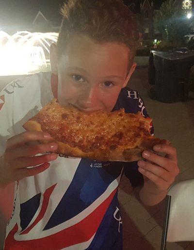 USA World BMX eating pizza